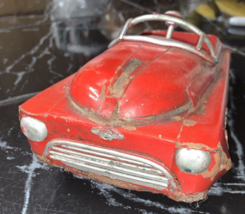 ? JOUSTRA ? VOITURE TOLE ROUGE ?? - $9.78