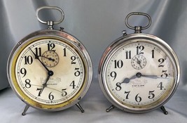 Lot (2) Antique NATIONAL CALL 8 Day Alarm Clocks, Silver w/ Peg Legs - For Parts - £58.75 GBP