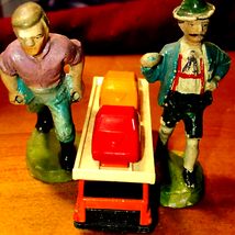 Two German figurines/truck made in England - £22.13 GBP