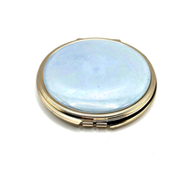 Mirror Compact Gold Tone Mother of Pearl Color Covered Top Made in Japan Vintage - $27.90