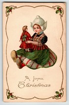 Christmas Postcard Dutch Girl Holds Doll John Winsch Back Germany Emboss... - $29.93