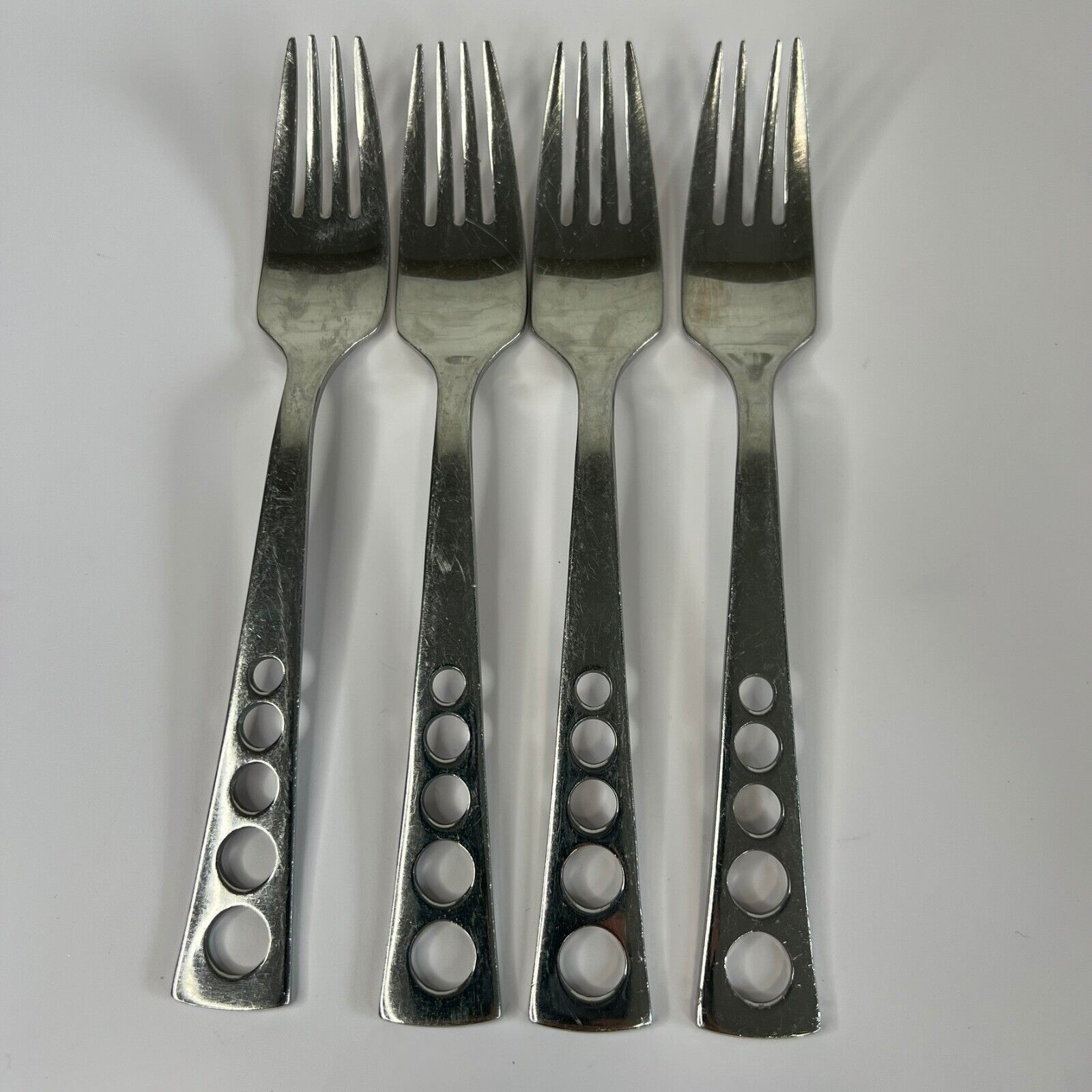 Set of 4 Oneida Apollo 18/10 Salad Forks 7&quot; Pierced Circles Glossy Finish - $20.00
