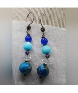Glass bead dangle earrings - $464.10 MXN