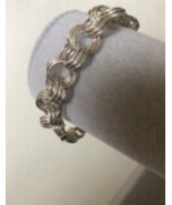 Silver bracelet 3-circle 9.5 inches - $650.00