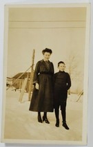 Rppc Lovely Woman with Boy Posing in Snow Postcard R1 - £7.83 GBP