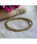 Monet Gold Tone Twist Shiny Finish 8” Bangle Bracelet - $425.47 MXN
