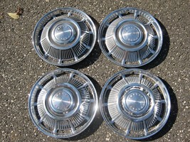 Factory original 1961 to 1963 Pontiac Tempest 15 inch hubcaps wheel covers - $46.40