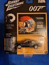 1987 Aston Martin V8 Dark Gray James Bond 1/64 Johnny Lightning - £5.93 GBP