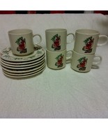 Gibson Housewares GID17 Santa and Holly 5 cups/mugs and 7 saucers, - $35.00