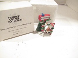 DEPARTMENT 56- HERITAGE VILLAGE 5608-1 TRIMMING THE NORTH POLE - LN BOXE... - $18.55