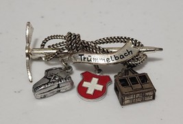 Vintage Trümmelbach Falls, Switzerland Souvenir Brooch Pin w/ charms Silver Tone - £9.10 GBP