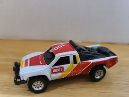 Maisto Toyota Sr5 Hilus 1/64 Diecast Off-road 4x4 Racing Car Truck - $15.00