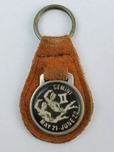 Vintage Gemini II leather keychain keyring metal back Brown w Black Face - $10.29