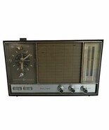 Vintage GE General Electric Superheterodyne Clock Radio wood grain - $41.49 CAD