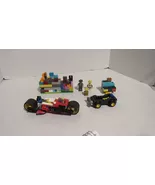 Vintage Small Lot Of Legos With Wheels And Blocks &amp; People - $10.00