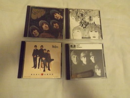 Four Beatles CDs – Lot B – With the Beatles/Real Love/Revolver/Rubber Soul - £25.73 GBP
