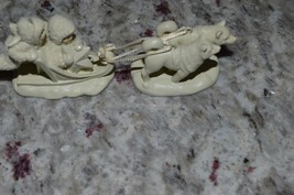 Department 56 - Two Snowbabies on Sled Pulled by Two Dogs - $43.00