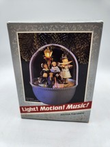 Joyous Carolers Hallmark Magic Light, Motion, Music Keepsake Ornament 1989 - $4.70