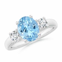 Authenticity Guarantee 
Oval Aquamarine and Round Diamond Three Stone Ring in... - £1,645.07 GBP