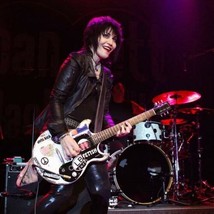 Joan Jett plays guitar in concert wearing leather outfit 12x12 photo - £15.72 GBP