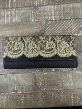 Womens Clutch Handbag Black And Gold Slightly Torn - $39.48
