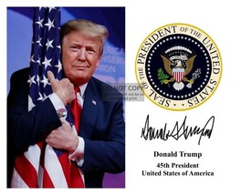 President Donald Trump Hugging American Flag Presidential Seal 8X10 Photo - £6.76 GBP