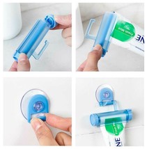 Toothpaste Dispenser Holder Tube Stand Rolling Tube Toothpaste Squeezer - $4.37