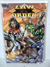 Law and Order #1 ( Maximum Press) Bagged and carded. FABIO LAGUNA - $1.79