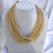 Vintage kleine kristallweiße Rocailles mit Münze Stammesschmuck - $59.62