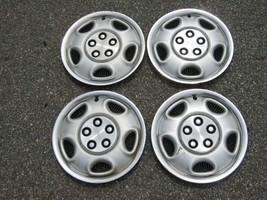 Genuine 1984 to 1995 Dodge Caravan Plymouth Voyager 14 inch hubcaps whee... - $55.75