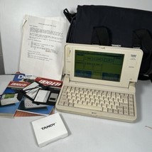 Tandy 1100FD Laptop Fully OPERATIONAL w/ original case, documents &amp; floppy disks - £335.55 GBP
