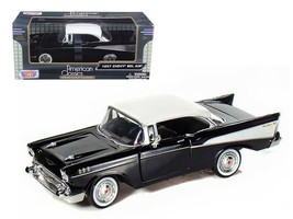 1957 Chevrolet Bel Air Black with White Top 1/24 Diecast Model Car by Mo... - $39.28