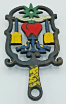 Vintage Cast Iron Hand Painted Footed Trivet Hearts Birds Brooms Marked 299 - $12.86