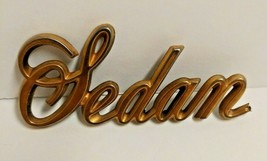 Cadillac &quot;Sedan&quot; Script Emblem Gold Tone - $9.49