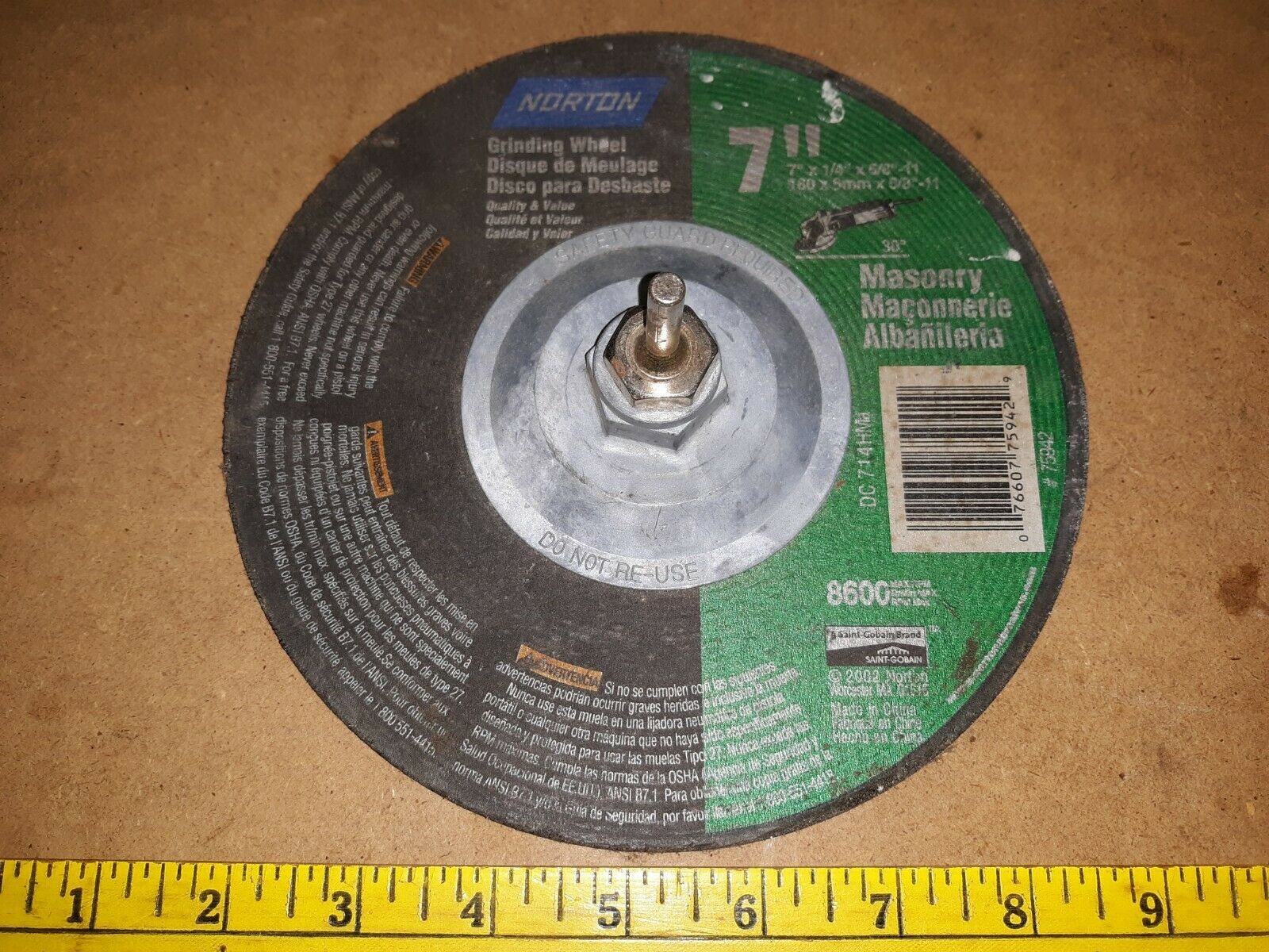 Primary image for 20EE06  GRINDING WHEEL, NORTON, 7” X 1/4”, MASONRY, WITH 1/4” MANDREL, LOOKS NEW