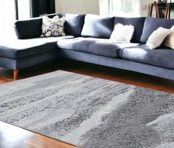 8&#39; X 11&#39; Blue and Gray Abstract Area Rug - $738.49