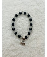 Black and grey glass bead bracelet with elephant charm. - $7.00