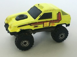 Mattel Hot Wheels 1984 Toy Truck Neon Yellow Terrain Jeep Monster Tires Vintage - $2.99
