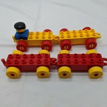 Lot Of (4) Lego Duplo Red Yellow Train Cars With Blue Overall Conductor - $13.89