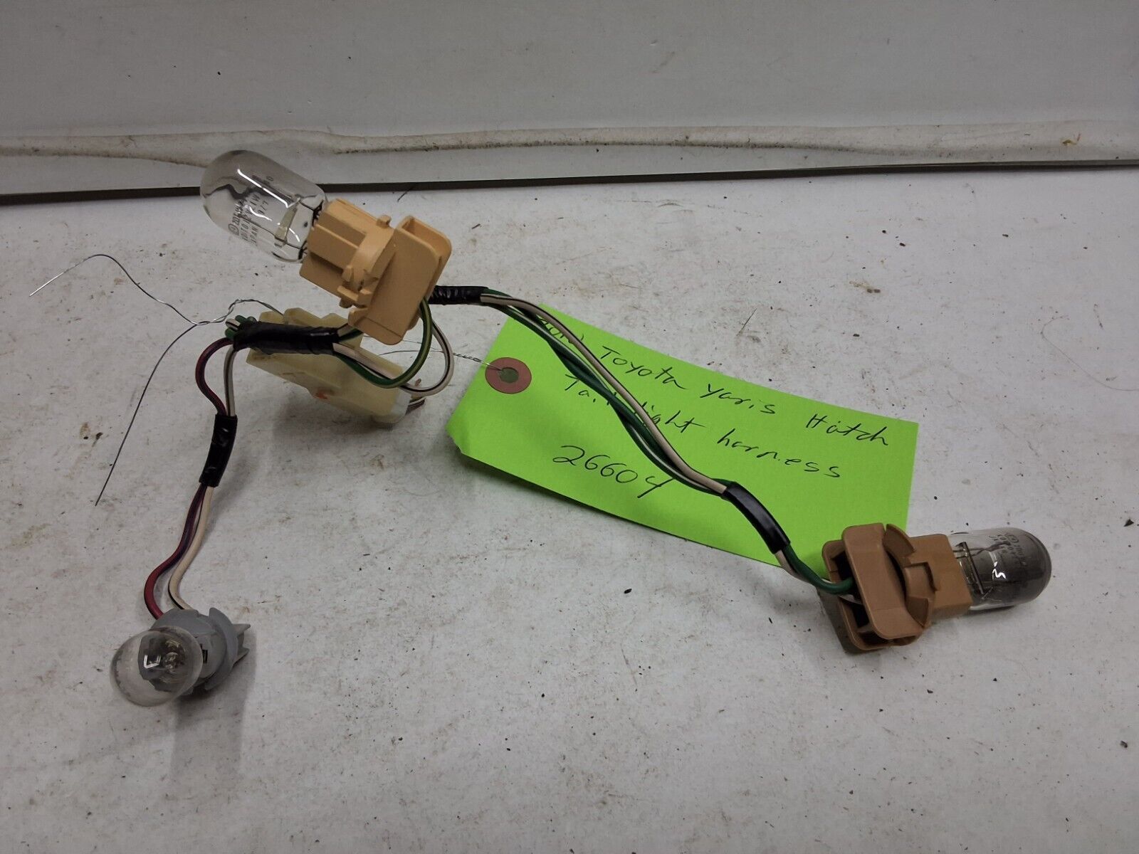 09 10 11 Toyota Yaris hatchback left or right outer tail light wiring ha... - $29.69
