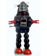 Rare vintage 1960 YOSHIYA KO JAPAN TIN WIND UP ACTION PLANET ROBOT TOY - $7,424.43 MXN