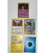 Lot of 5 Pokémon cards pikachu Stufful Mimikyu Bewear Reverse Holo Energy - $173.27 MXN
