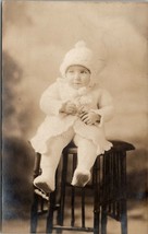 Rppc c1910 Baby in Knitted Outfit on Antique Craftman Style Stool Postcard U2 - £6.69 GBP