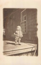 RPPC Child in Winter like attire on porch #1 - £7.57 GBP