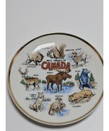 Vintage Canada&#39;s Wild Animals Milk Glass Gold Trim Wall Plate Moose Wolf... - £14.69 GBP