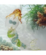 Hand Blown Art Glass Mermaid Holding a Starfish Ornament With Glitter St... - $620.68 MXN