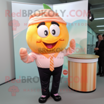 Peach Cupcake mascot costume character dressed with a Trousers and Ties - £991.19 GBP