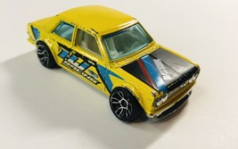 Hot Wheels Datsun Bluebird 510 Yellow Nightburnerz Series - £7.71 GBP