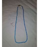 YOUNG LADY&#39;S BEADED BLUE NECKLACE ON PINK THREAD - $10.29