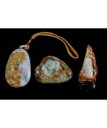 THREE CHINESE LAVENDER AND RUSSET JADEITE CARVINGS - £958.42 GBP